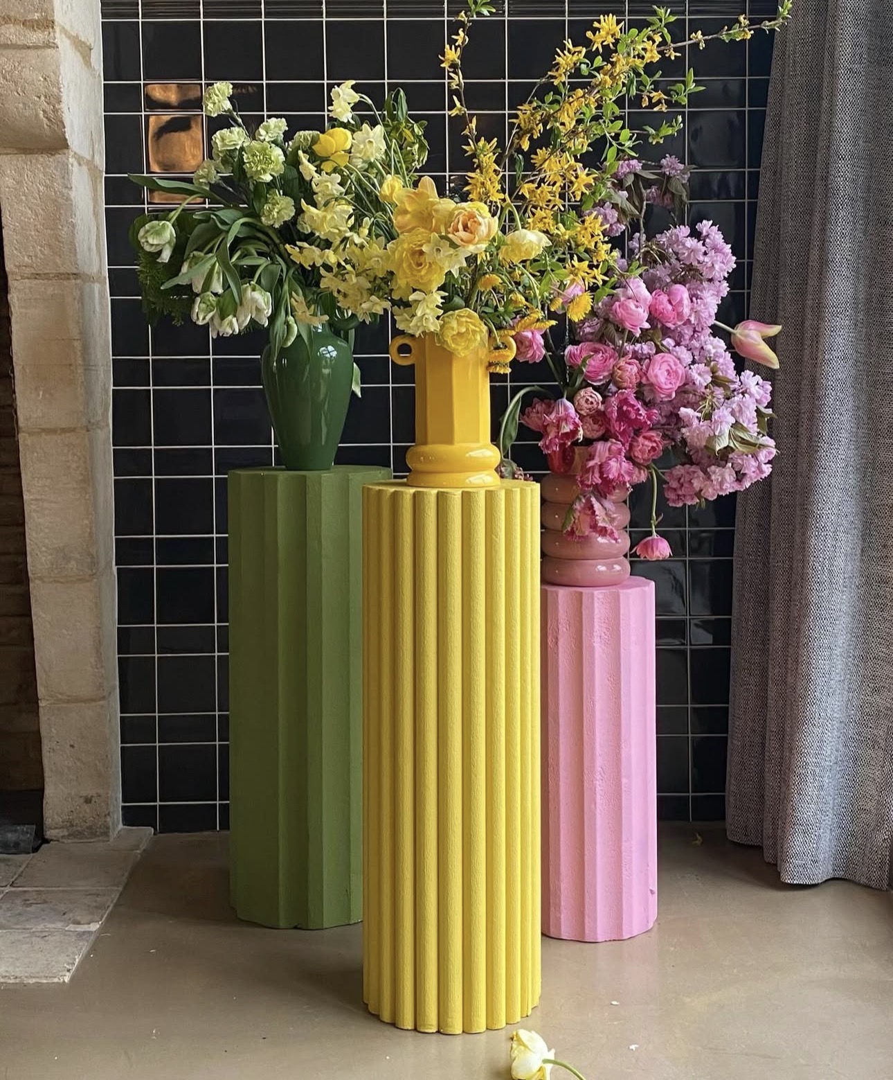 A luxury floral installation on pedestals