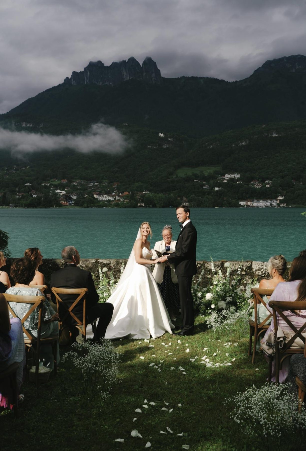 A wedding ceremony by the lake, in the mountains